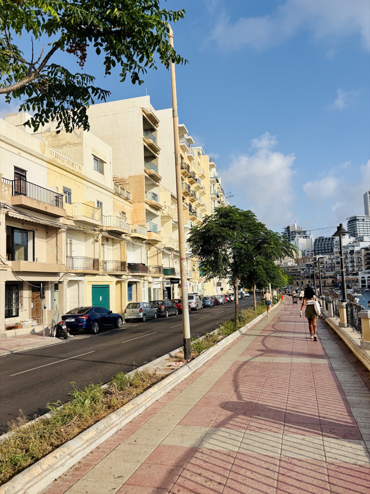 Seafront promenade and apartment buildings along the Sliema and St Julian’s coast